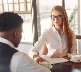 Job applicant being asked behavioral interview questions by an interviewer